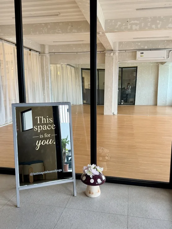 Kalma Pilates and Yoga - Retail corner, your calm starts here wall